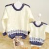 sweater con guarda de jacquard tejido a mano con lana hipoalergénica
