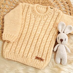 sweater ochitos tejido a mano en lana hipoalergénica