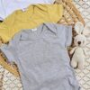 set de 3 bodies de algodón de mangas cortas con cuello americano