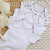 set de 3 bodies de algodón de mangas cortas con cuello americano