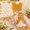 conjunto de vestido de algodón estampado con torerita y zapatitos tejidos en hilo de algodón